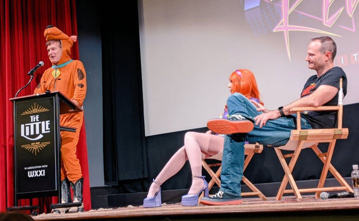 Joe Bob, Ben, and Darcy on stage at The Little Theatre in 2022