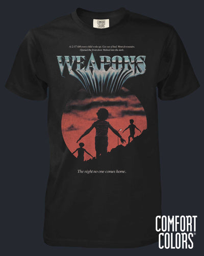 Black t-shirt with a graphic design of a sunset scene and text on a dark background