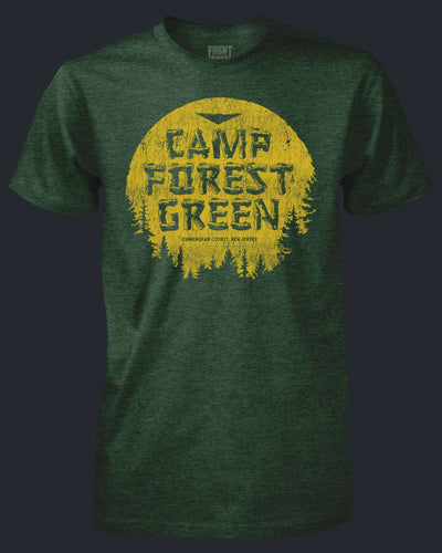 Green t-shirt with 'Camp Forest Green' text and yellow circle design on a dark background