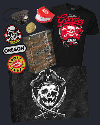Collection of Goonies-themed merchandise including t-shirt, stickers, and props on a dark background.