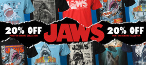 Promotional banner for 'JAWS' t-shirts with discounts and shark graphics.